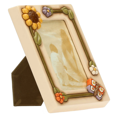 Portafoto Country, medio