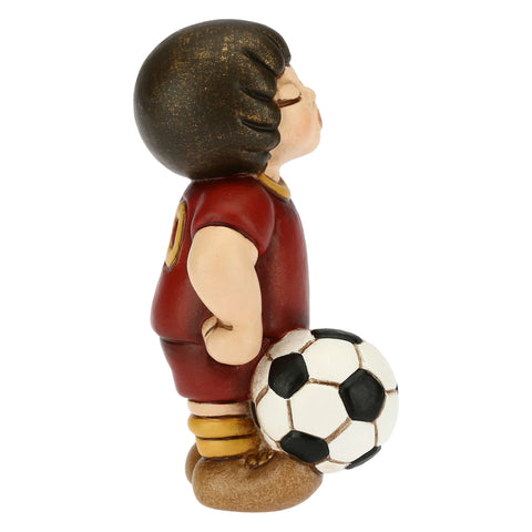 Bimbo calciatore giallo piccolo