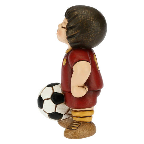 Bimbo calciatore giallo piccolo