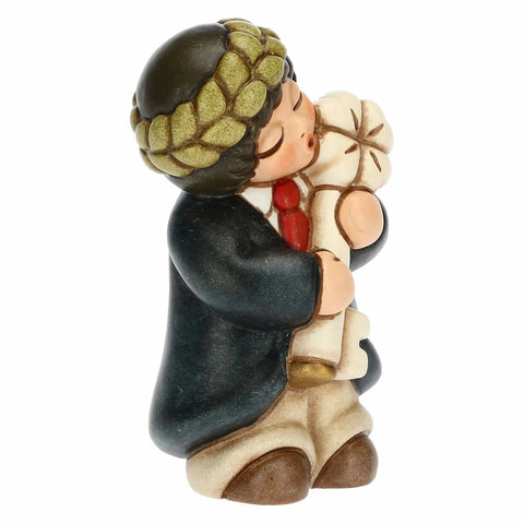 Bimbo laurea con coccinella e pergamena