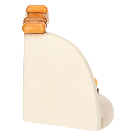 Bottega della sarta con cesti di stoffe  Thun