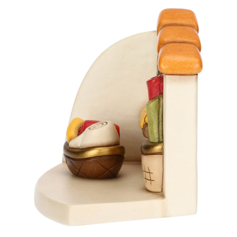 Bottega della sarta con cesti di stoffe  Thun