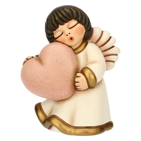 Angelo in ceramica con cuore rosa