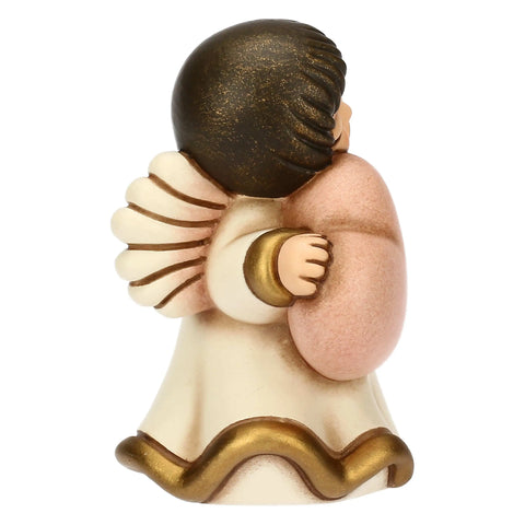 Angelo in ceramica con cuore rosa