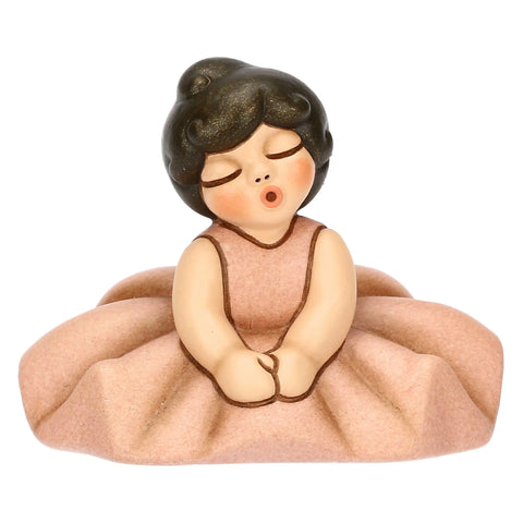Ballerina rosa seduta in ceramica