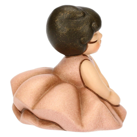 Ballerina rosa seduta in ceramica