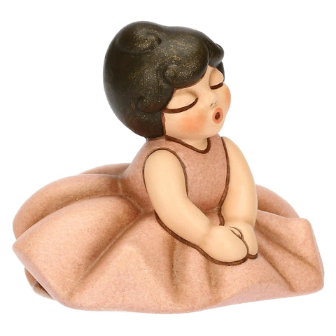 Ballerina rosa seduta in ceramica