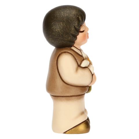 Bimbo in ceramica con giglio Thun