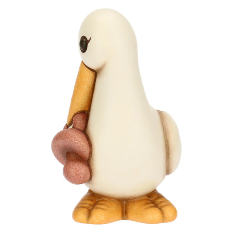 Cicogna Cindy in ceramica con ciuccio rosa