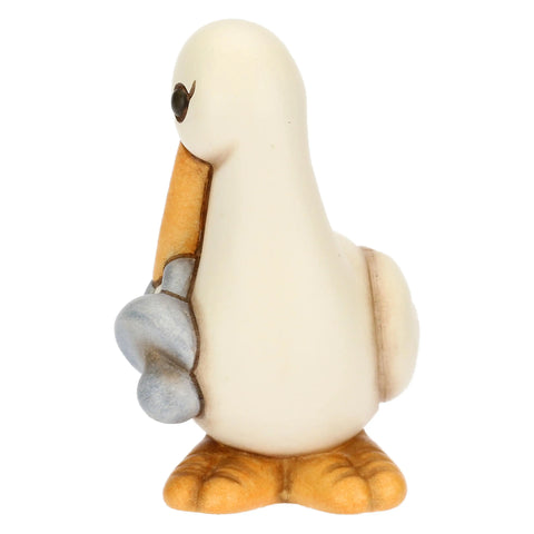 Cicogna Cindy in ceramica con ciuccio azzurro