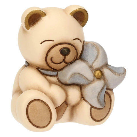 Teddy in ceramica con girandola azzurra