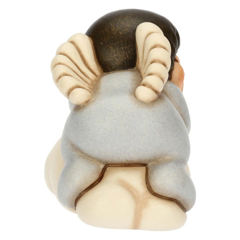 Angelo azzurro in ceramica su nuvola