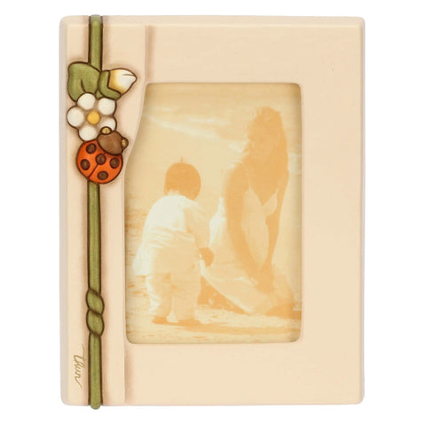 Portafoto in ceramica con coccinella e fiori