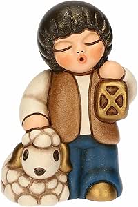 Bimbo con lanterna in ceramica BLU