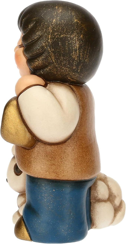 Bimbo con lanterna in ceramica BLU