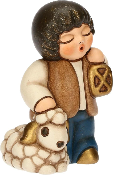 Bimbo con lanterna in ceramica BLU