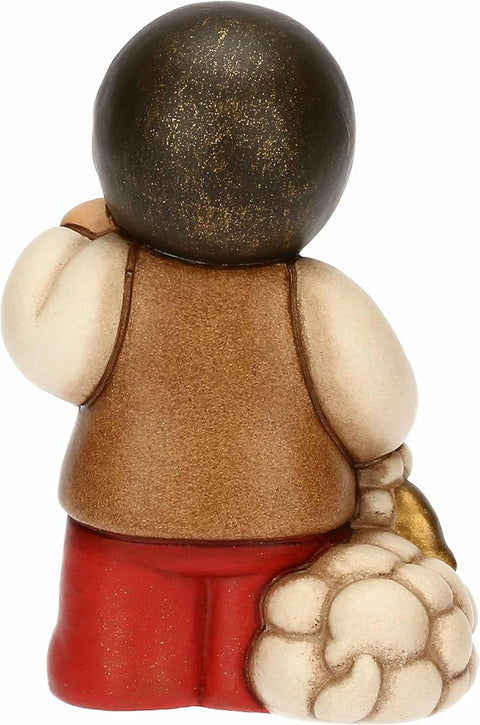 Bimbo con lanterna in ceramica ROSSO