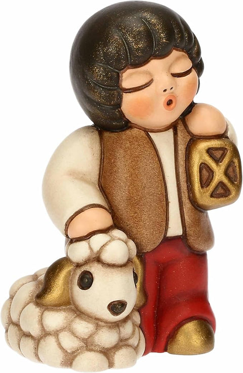 Bimbo con lanterna in ceramica ROSSO