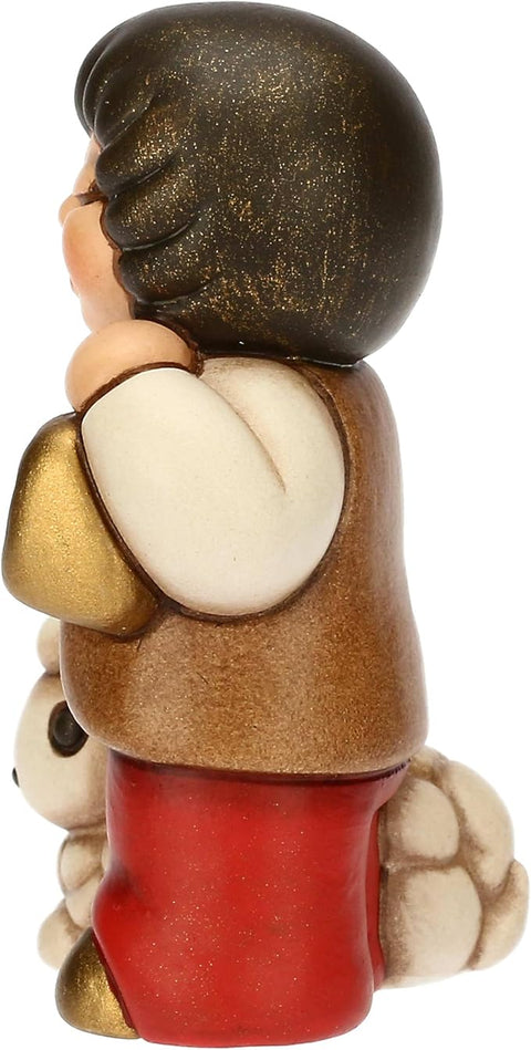 Bimbo con lanterna in ceramica ROSSO