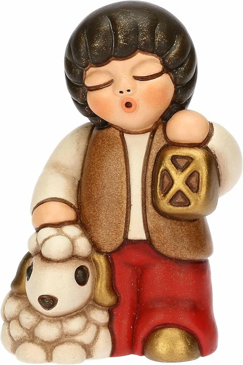 Bimbo con lanterna in ceramica ROSSO