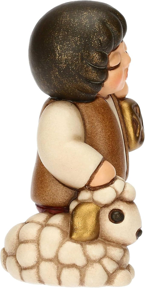 Bimbo con lanterna in ceramica ROSSO