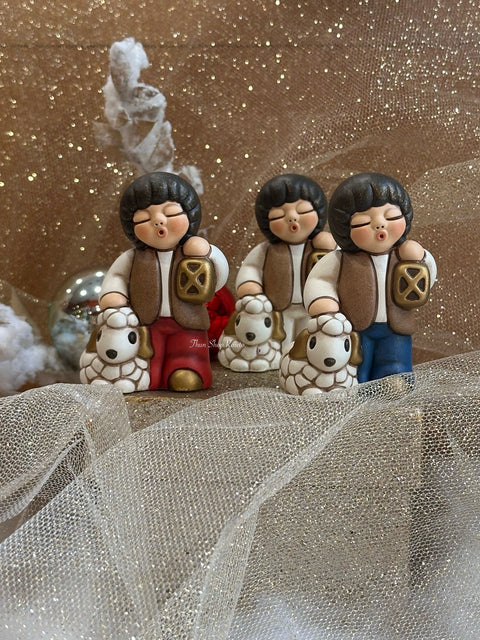 Bimbo con lanterna in ceramica BIANCO