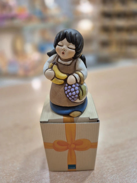 Donna con frutta Presepe classico variante blu Thun
