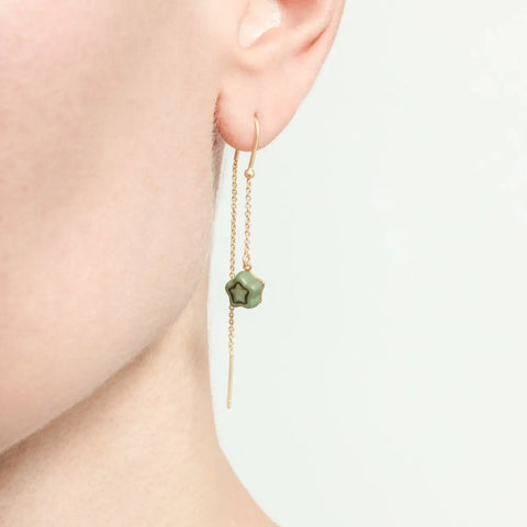 Orecchini pendenti con stella in ceramica