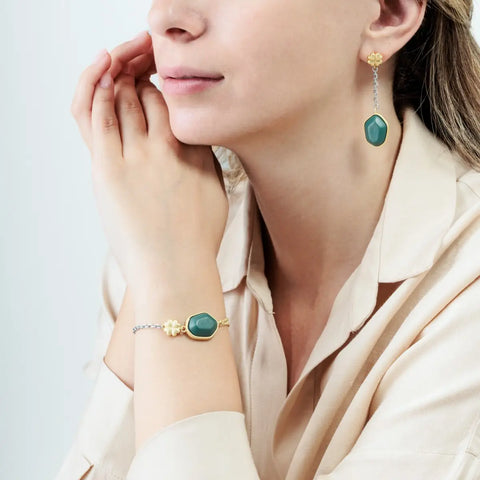 Bracciale con pietra ceramica e quadrifoglio