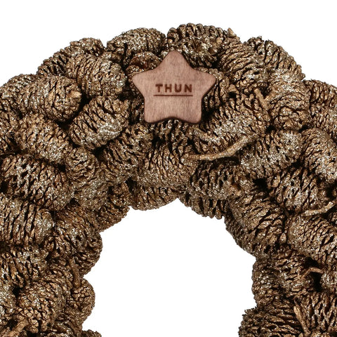 Ghirlanda decorativa con pigne, oro